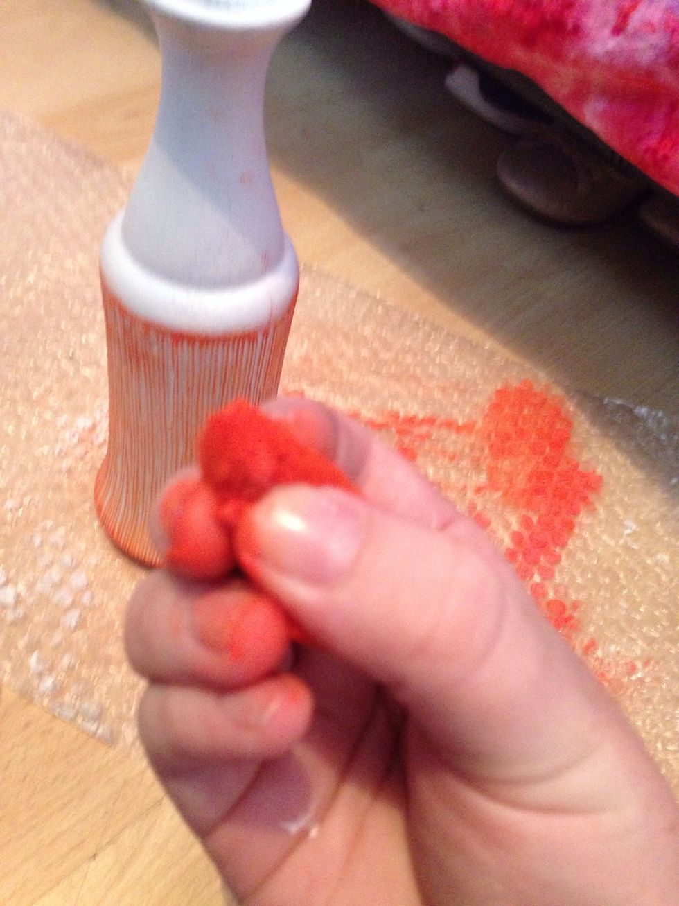 Squeeze your sponge to a corner point and add more loose paint