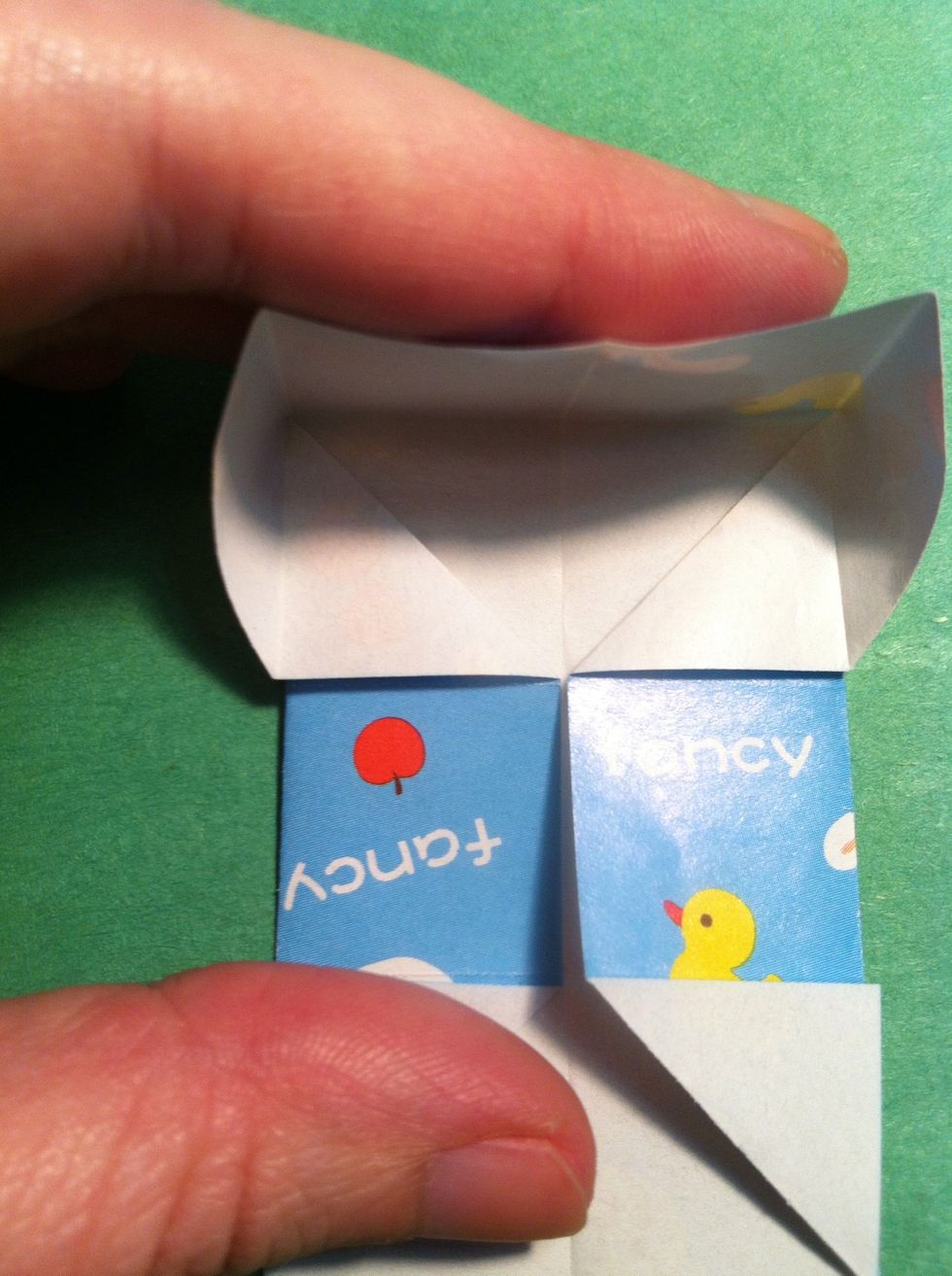 Squish the top edge down...