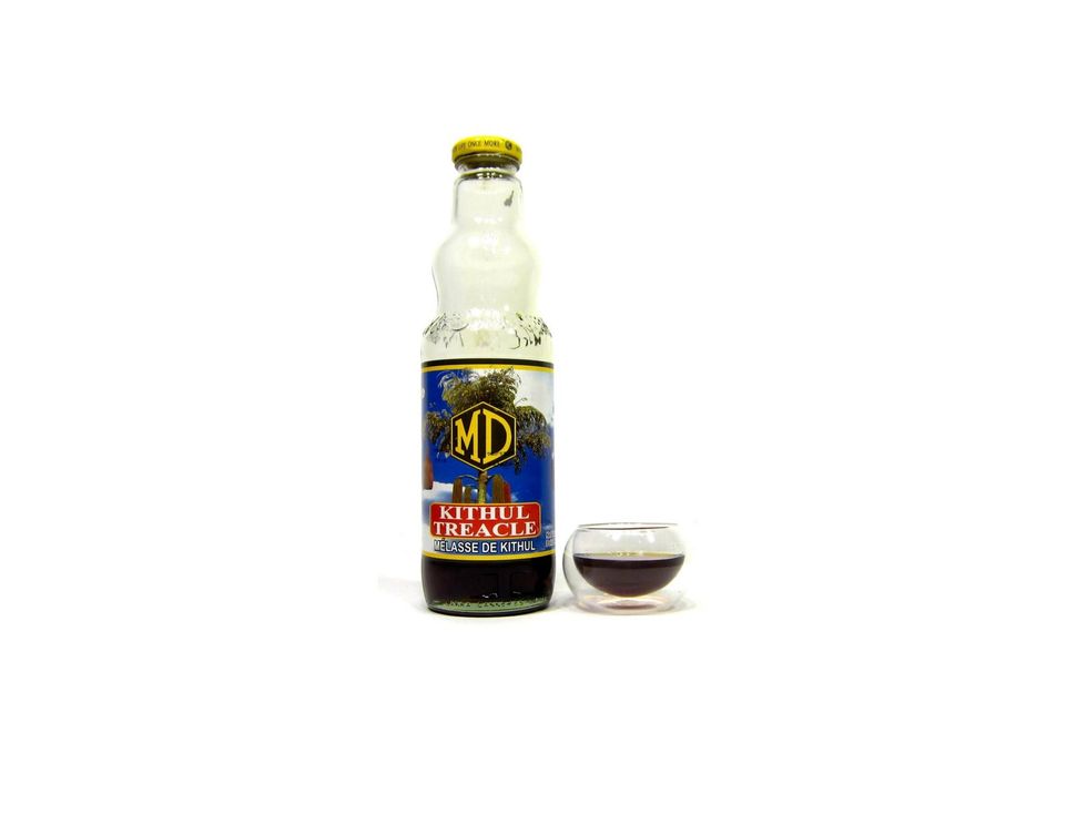 Sri Lankan Kithul Treacle is made from the sap of a Caryota urens type palm tree. It's available at most Indian stores for about $5.00 (26oz.). Now that's a steal. The MD brand is best.