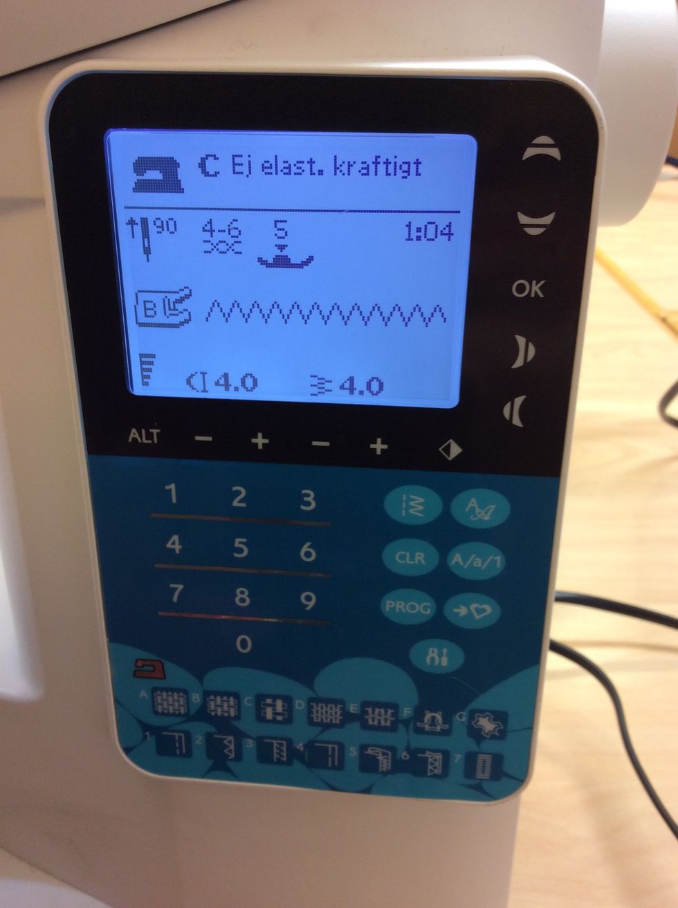 St\u00e4ll in symaskinen p\u00e5 sick-sack.