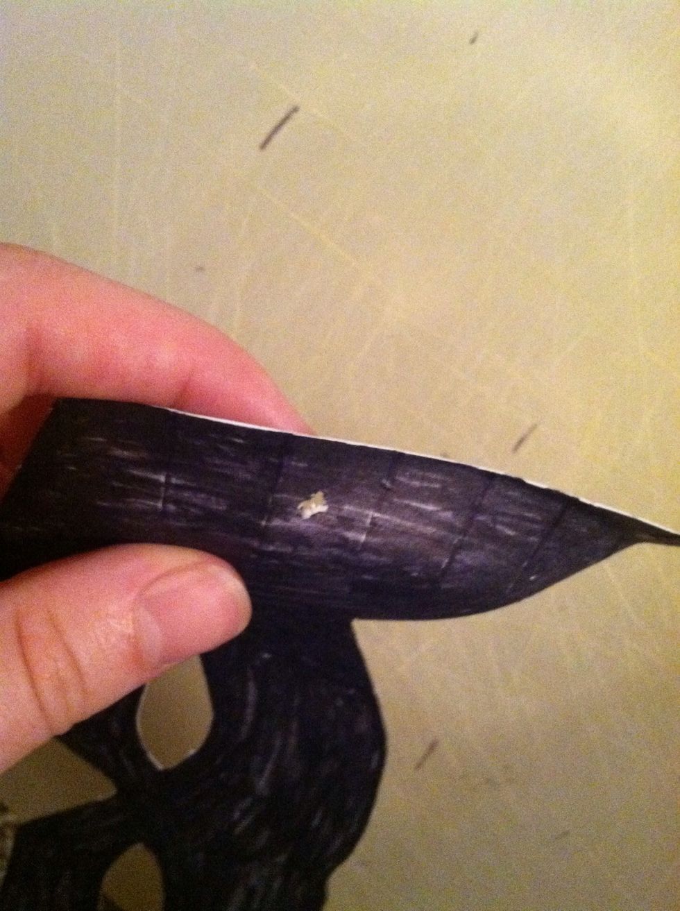 Stab a hole in each side for the ribbons.