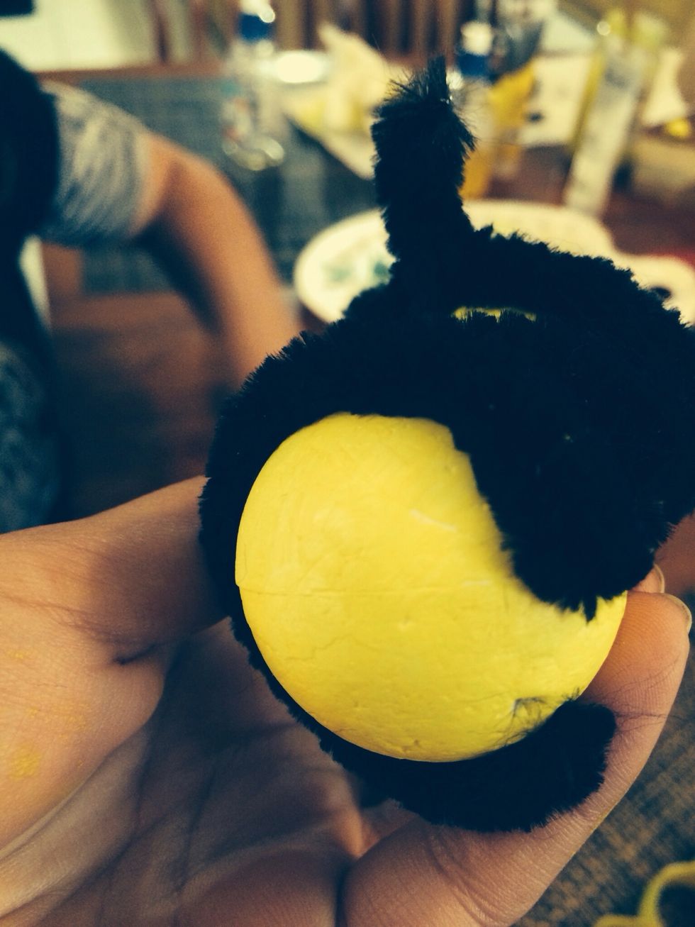 Stab the pipe cleaner into the ball to secure it. (Just like making the head.)