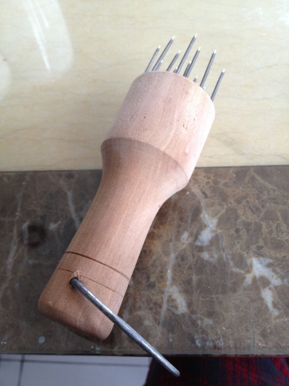 Stab the pork belly skin with the Chinese fork evenly many times to create air pockets for crispy skin when baking