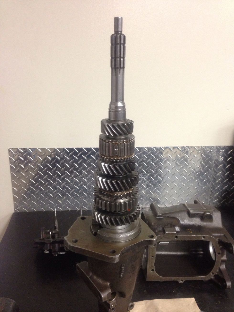 Stack all the gears and the synchronizer rings and hubs