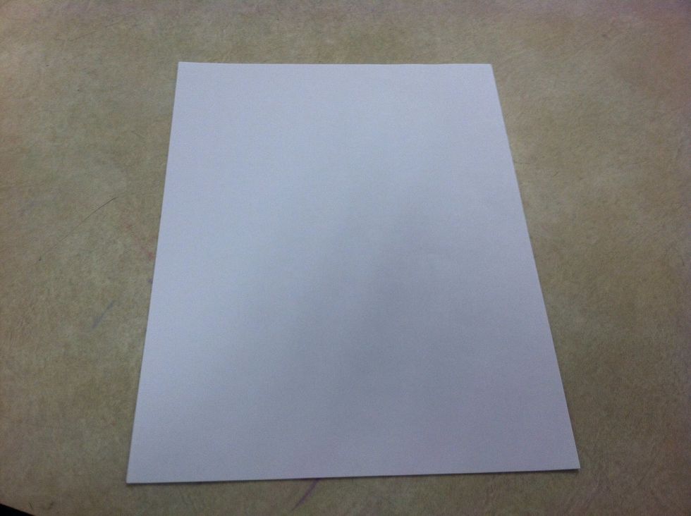 Stack and tap 5 sheets of copy paper. Make sure they are even.