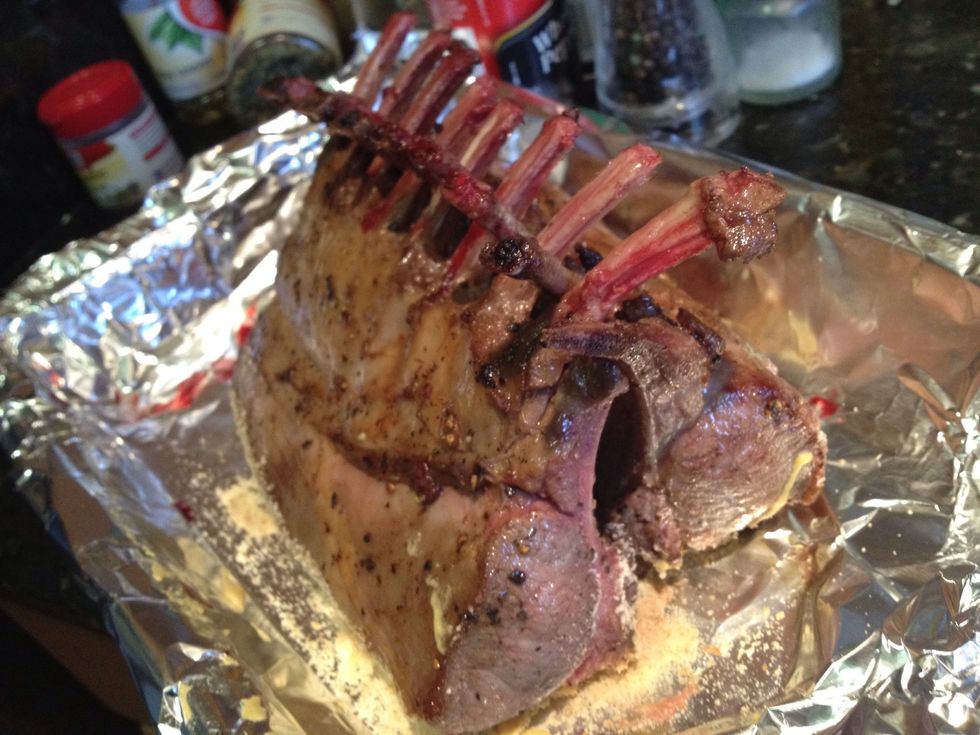 Stack both racks of lamb onto baking pan.