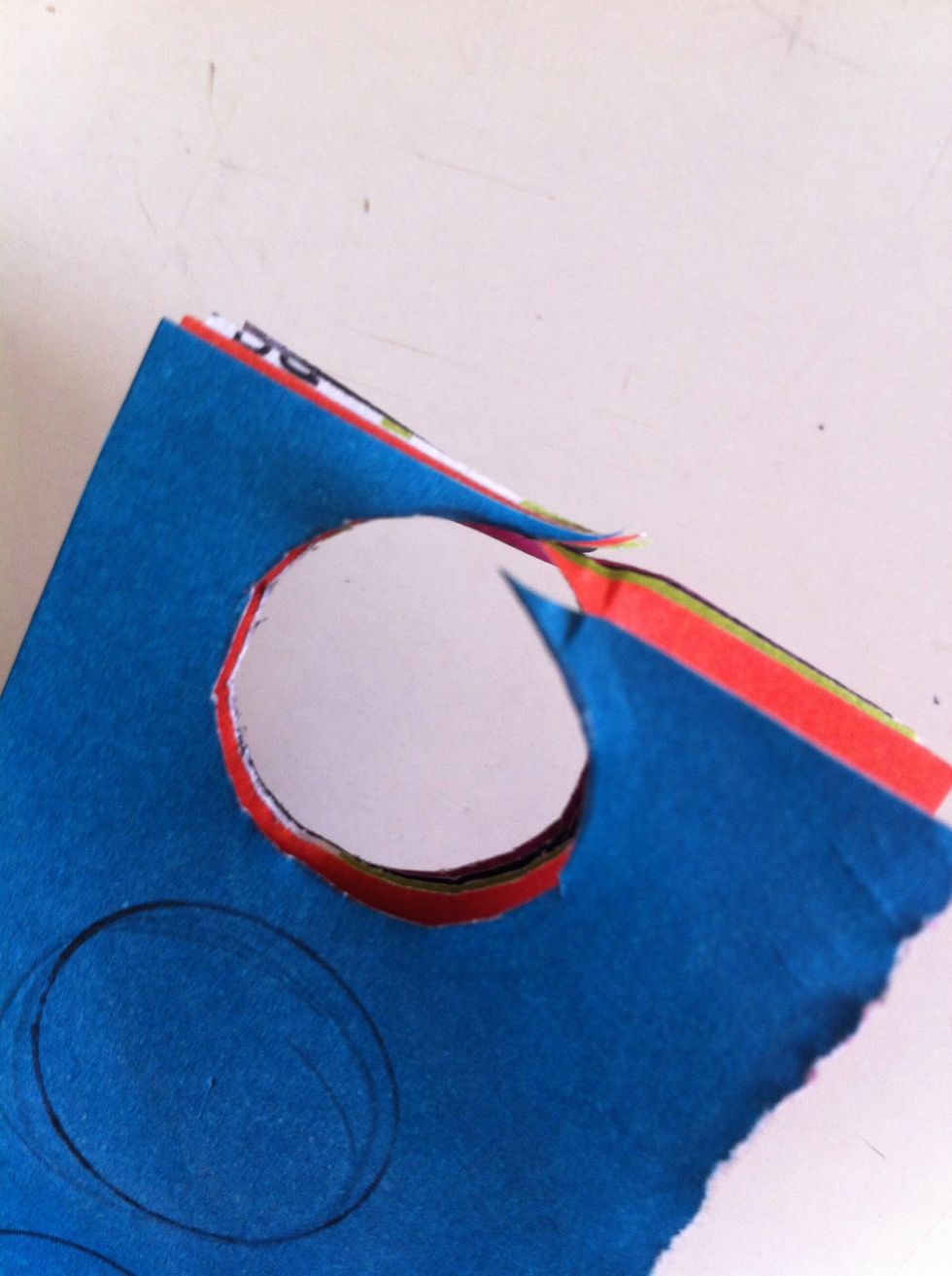 Stack different colored papers behind the first sheet and cut out your circles :))