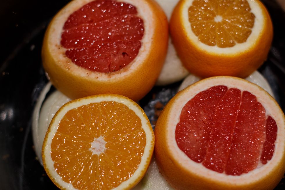 Stack the citrus on top of the onions.