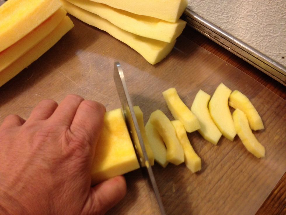Stack the halves and slice into half inch thick pieces. They resemble peeled and cored apple slices, don't they?