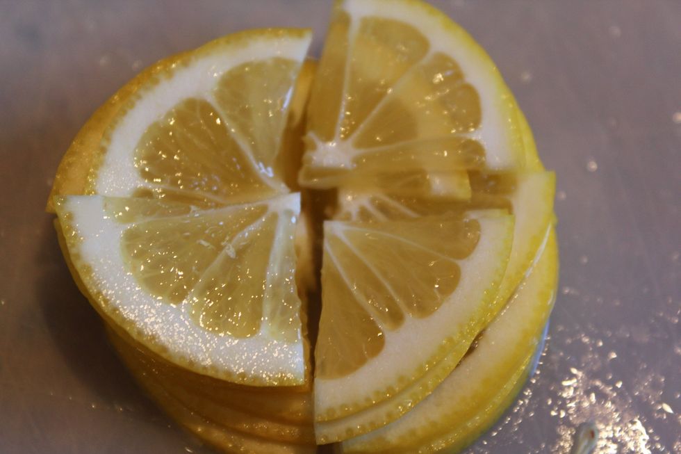 Stack the rounds and slice into quarters.