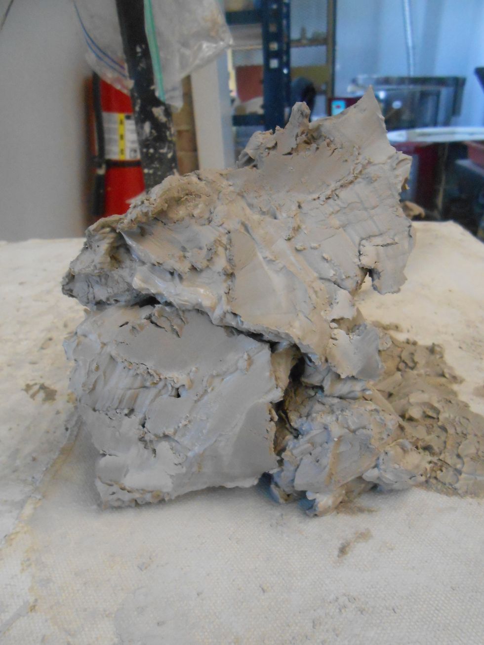 stack them up, the first few times you cut the clay and stack it it will be a mess like this but start to come together after the first 10 cuts