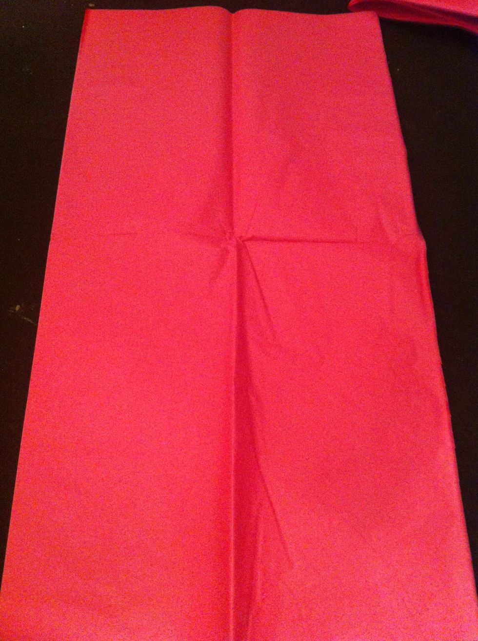 Stack tissue paper on top of each other