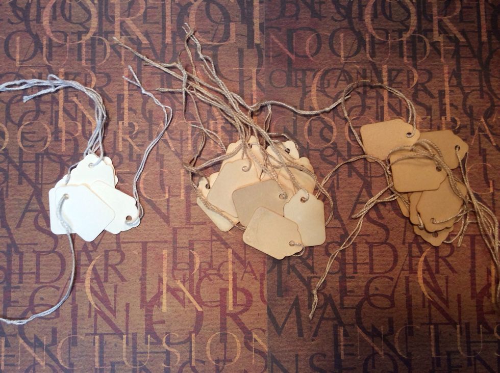 Stages...the first (white) tags are before aging. The middle tags are after a 1/2 hour soak. The third set are tags soaked over night.