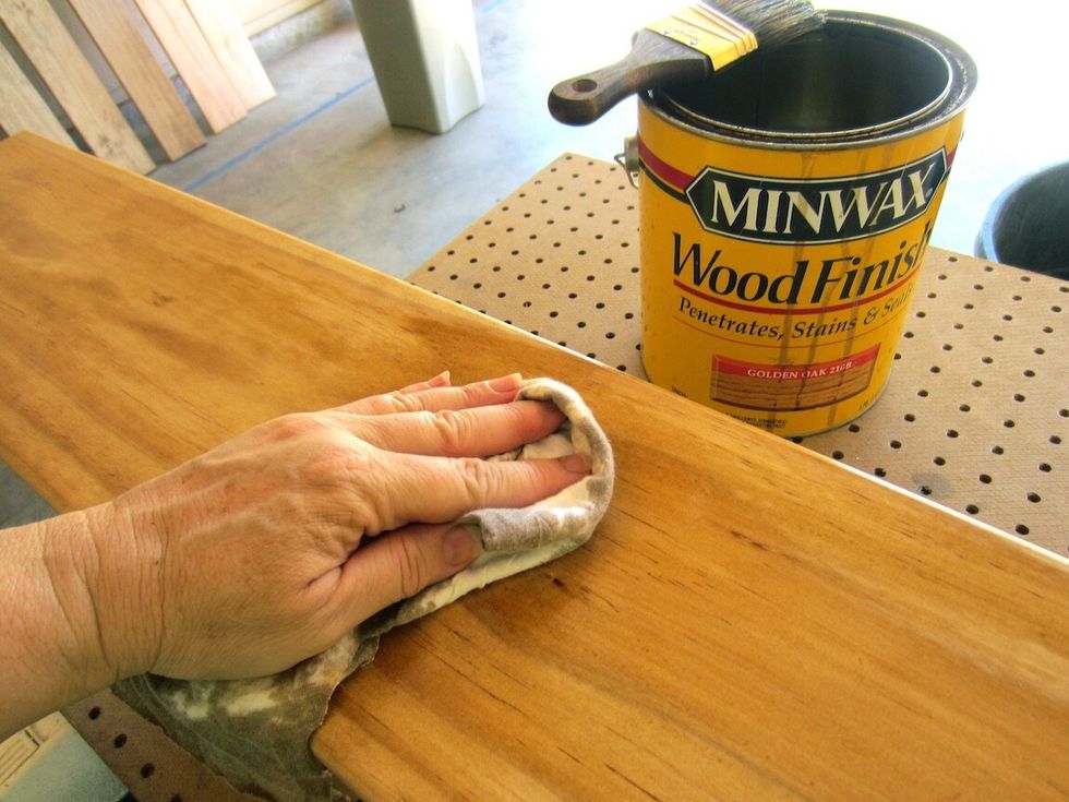 Stain with a basic, oil based stain that isn't too dark. (Test on back to make sure!) Avoid using products that cut corners on drying time like "quick dry" or "poly blends".