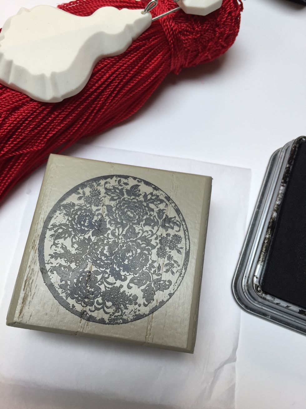 Stamp a piece of tissue paper