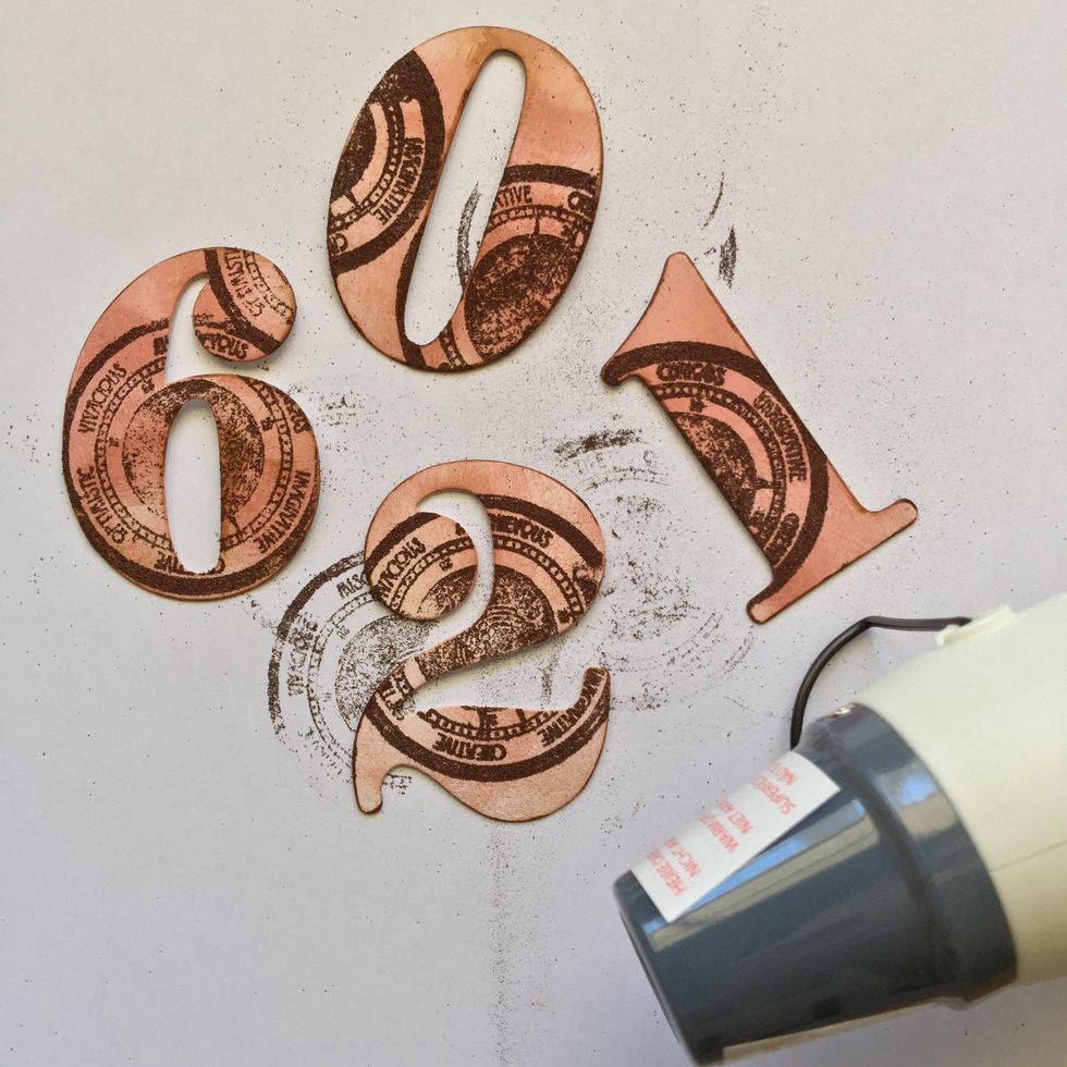 Stamp and add embossing powder. Apply heat gun.