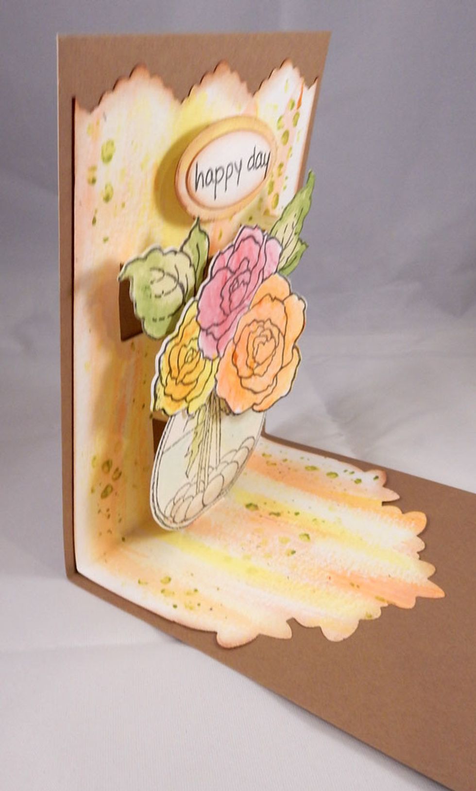 Stamp and die cut the sentiment and adhere to the top of the card.  Adhere the painted panel to the card base.