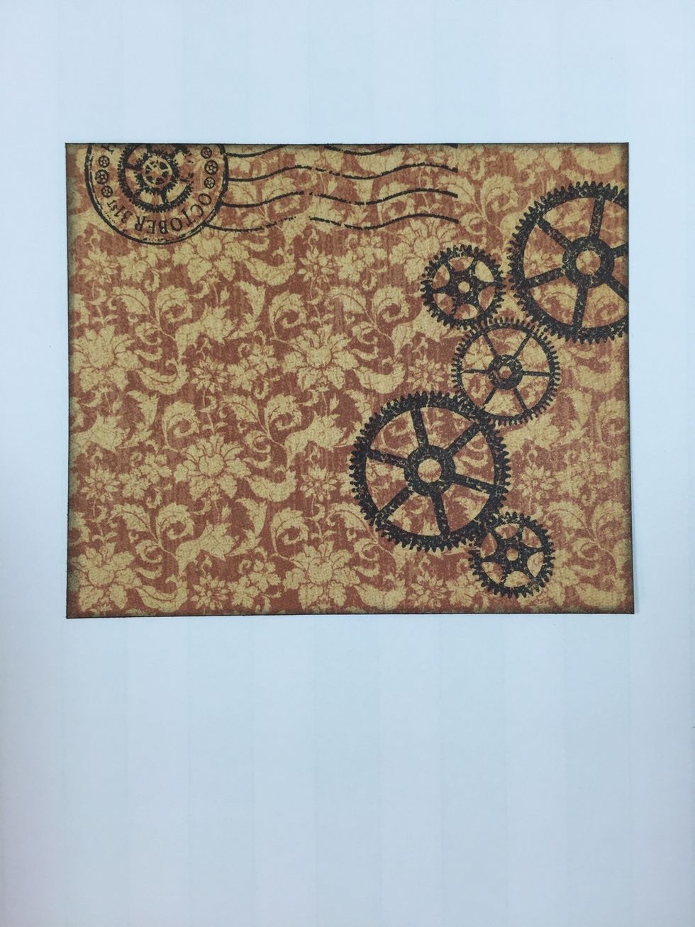 Stamp gears and any desired Steampunk imagery with black ink onto pattern paper piece.