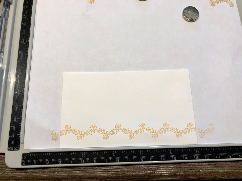 Stamp multiple times with the Decades Venetian Lace ink to get a sharper image.