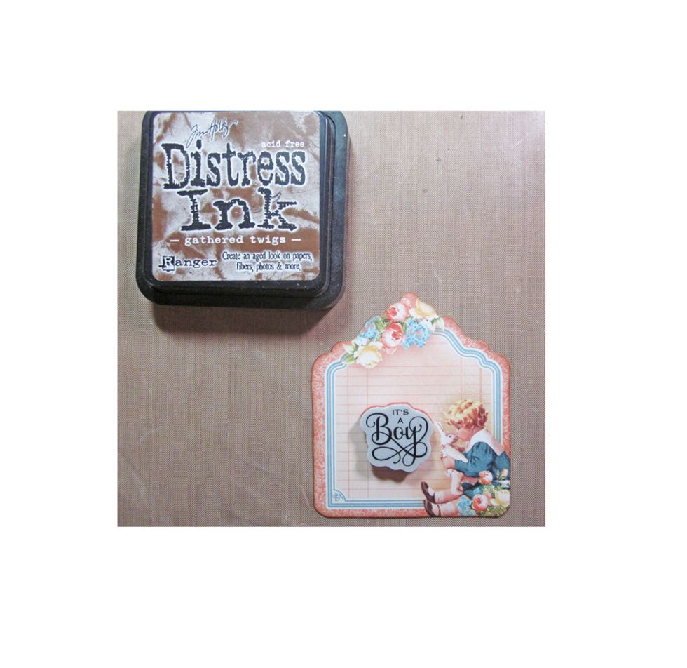 Stamp sentiment on tag using gathered twig distress ink.