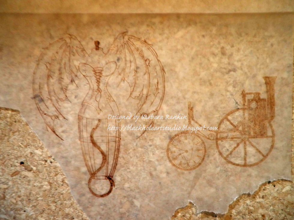 Stamp Sin City Stamps winged dress form and steam engine onto deli wrap with StazOn Spiced Chai.