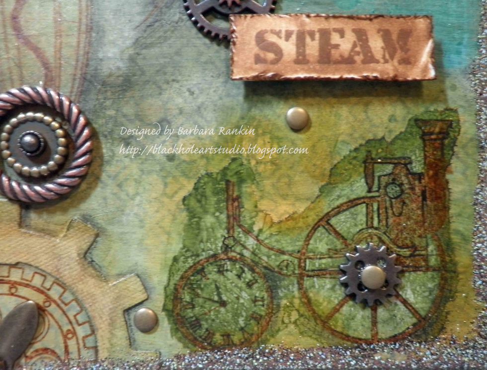 Stamp "STEAM" onto smooth white card stock with StazOn Spiced Chai. Cut out, distress edges, color with a brown distress ink, adhere with foam dots.