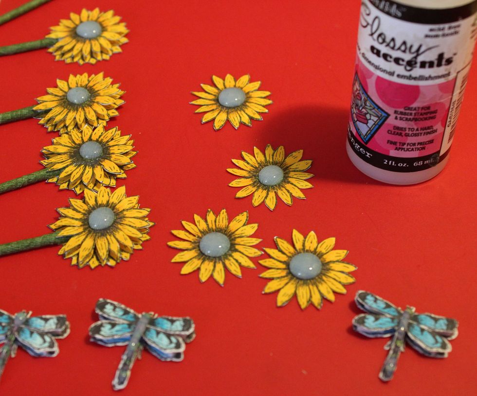 Stamp Sunflowers, Color with markers, fussy cut out...Add Glossy Accent to center, allow to dry. Color Dragonflies, fussy cut out
