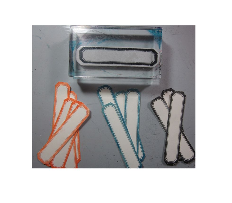 Stamp tags in coordinating ink colors. These will hold the inspirational menu. You'll find the menu for each box on the next few steps. There is an embellishment cube, Paper cube and Techniques.