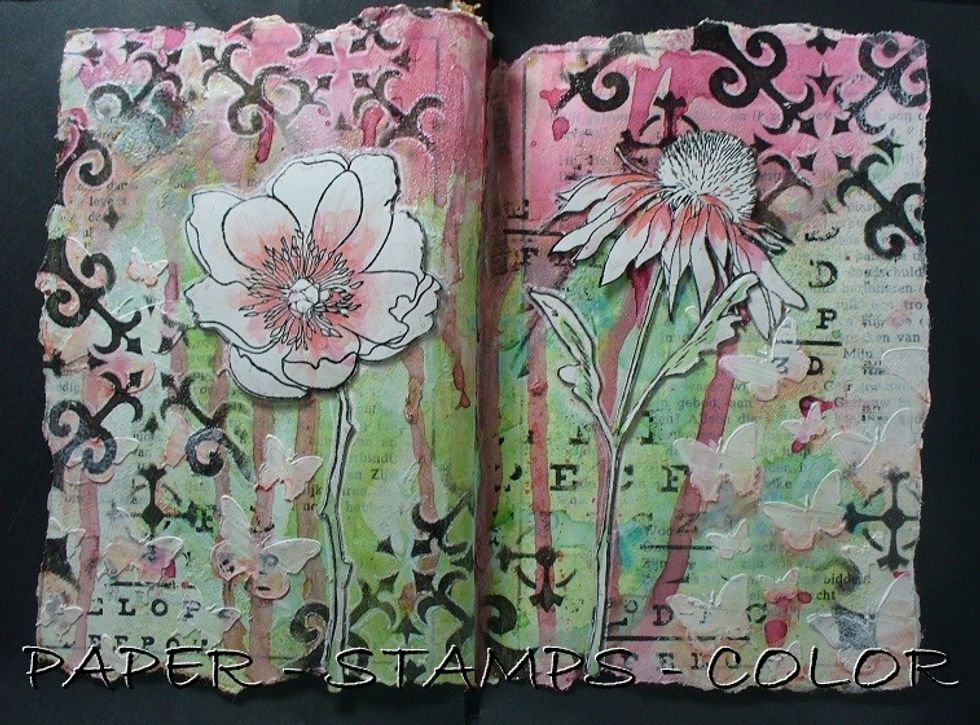 Stamp the flower  images on a separate piece of cardstock and cut it out. Adhere to page as shown. Color them with the same colors of spray inks as mentioned in step 1 and 2 - I used a waterbrush.