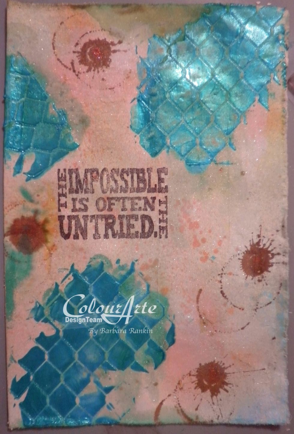 Stamp the sentiment with sepia archival ink. For color variety, dab ColourArte Mallard Radiant Rain over the dried gel, spritzing with water and allowing to run in different directions. Let dry.