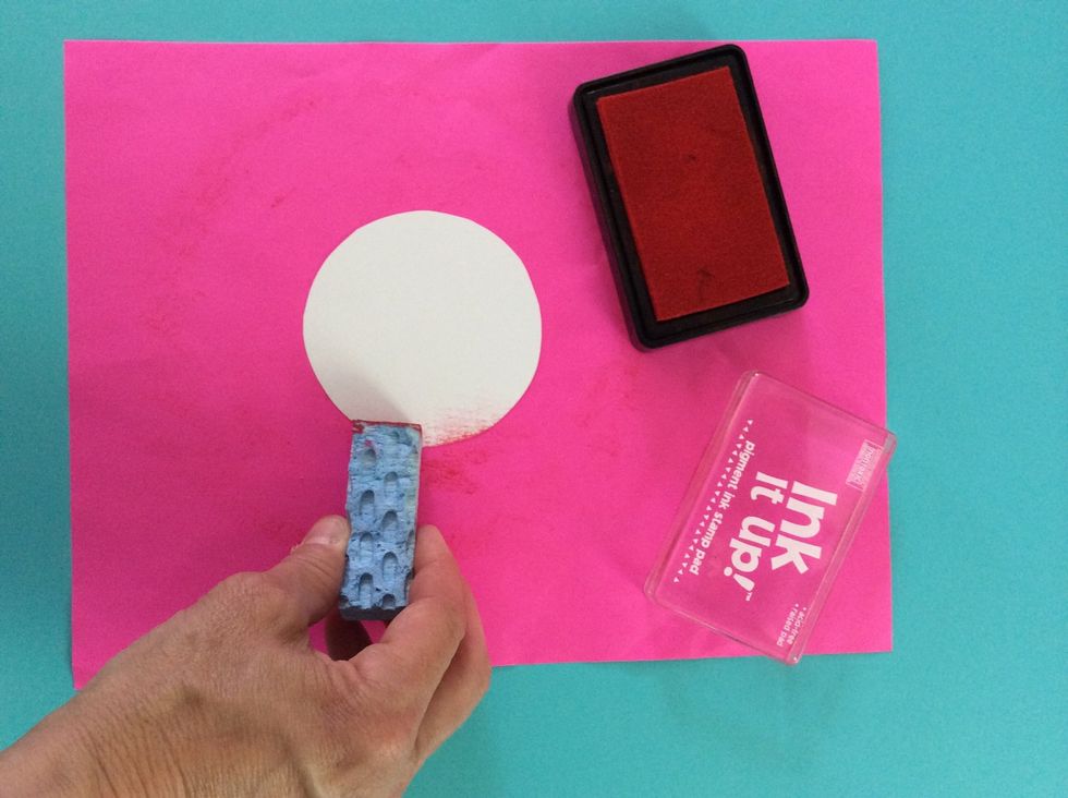 Stamp the smallest circle same as the first two.