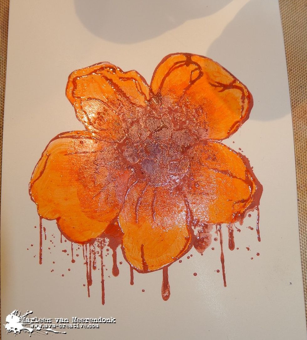 Stamp with 1 distress oxyde color and emboss with clear embossing powder. Color the flower the same way.