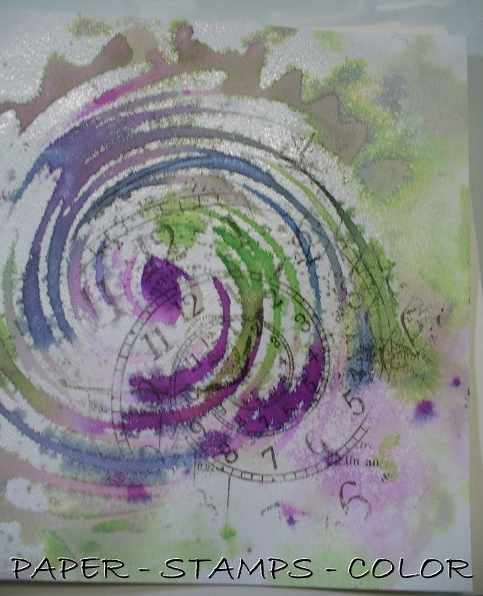 Stamp with the Katzelkraft stamp in the background with a dark ink.