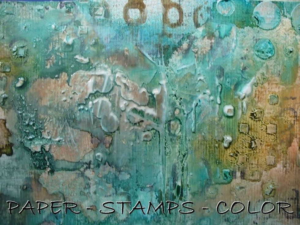 Stamp with the same script in the background without adding ink, but use the partially dried ink to stamp with. It will also take some gesso away in places, and add interest to the background.