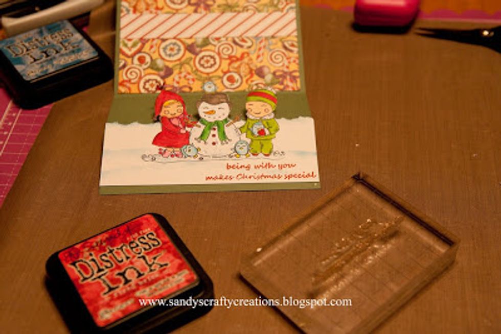 Stamp your sentiment to the lower right edge of the card. Fold open the card so it lies flat before you stamp it.