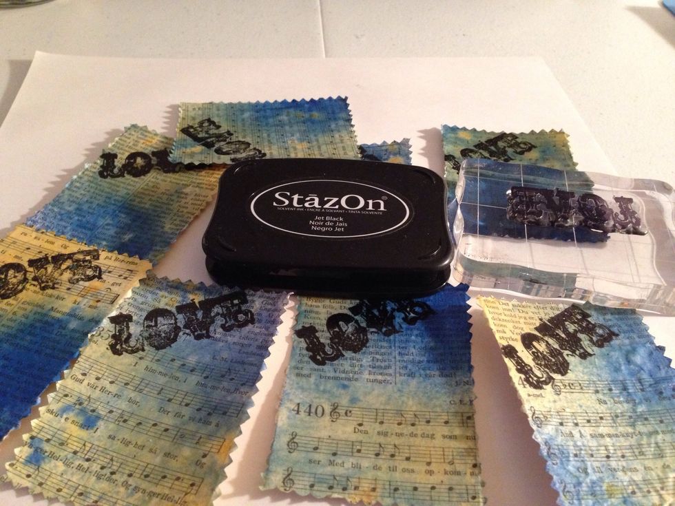 Stamped 'Love' with black StazOn ink.