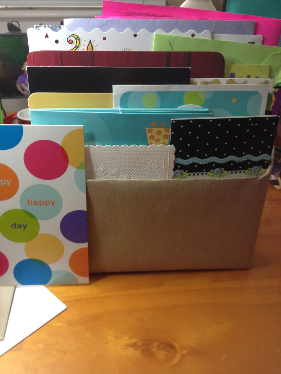 Stand a card next to the box to see where it should go. (Depending on the height of the card. )