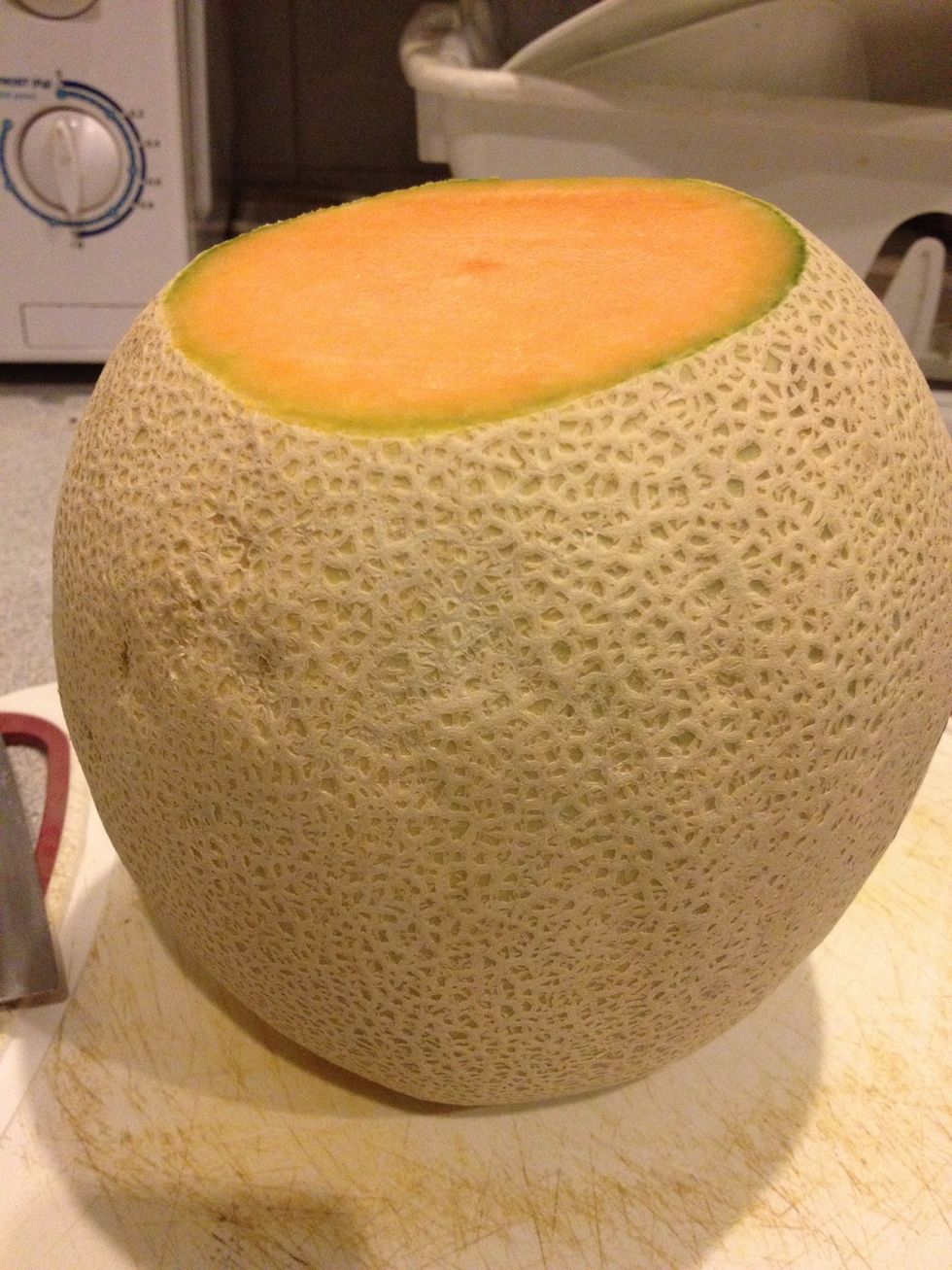 Stand the melon like so