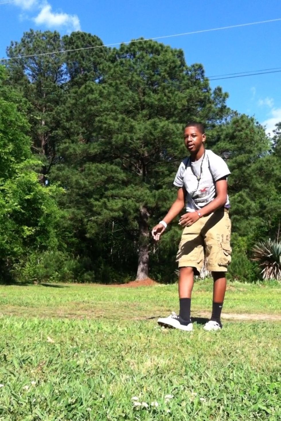 Stand up and you've just performed a backflip !