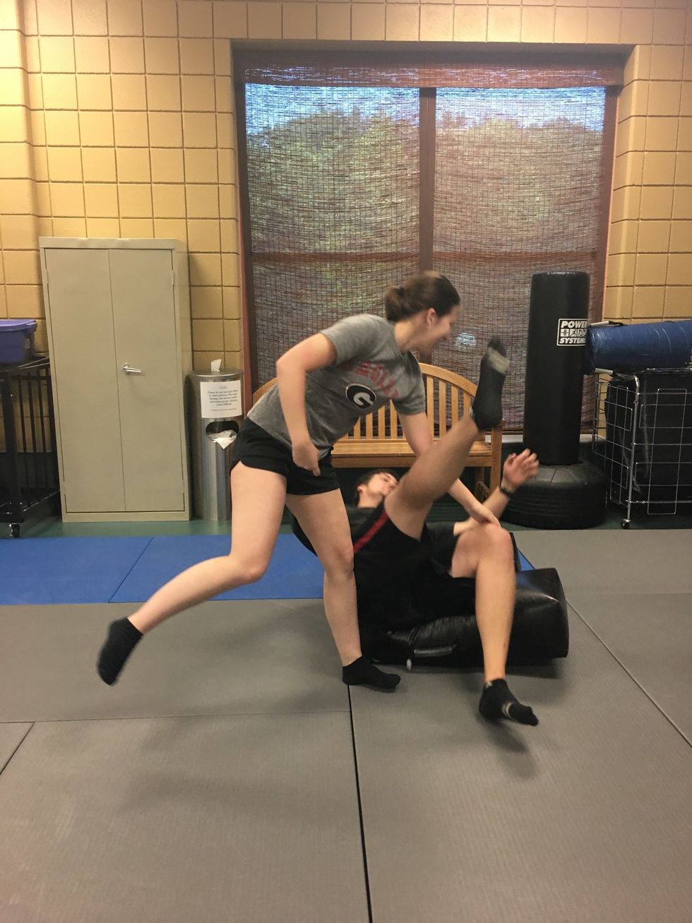 Stand up straight and let go at top of arc