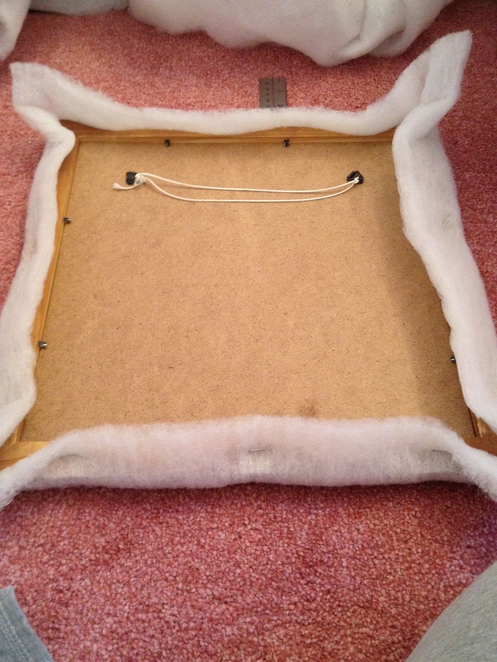 Staple a the sides but check the front to make sure it is smooth