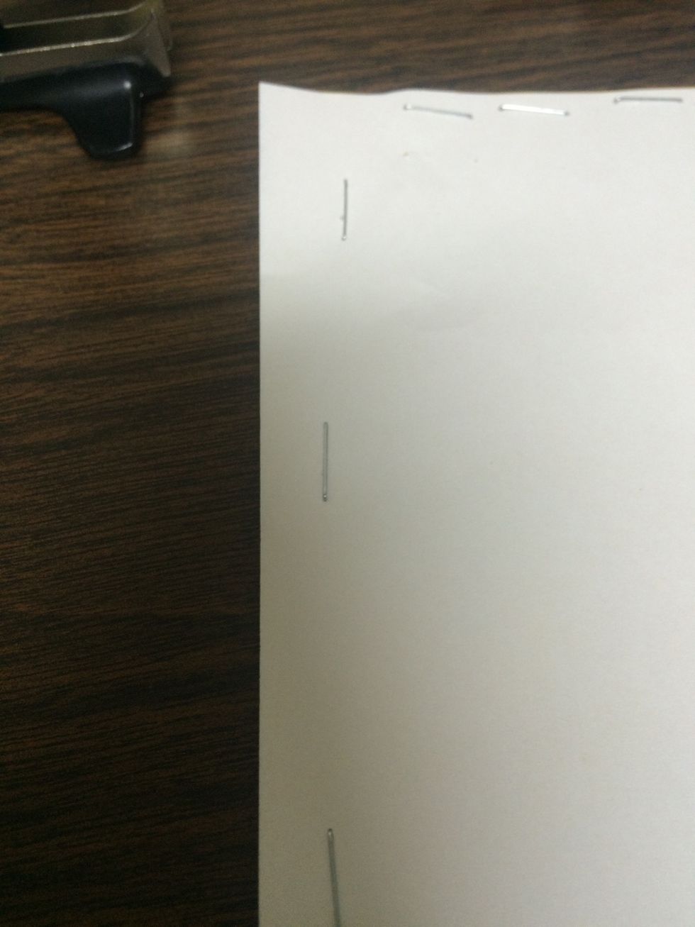 Staple down the side