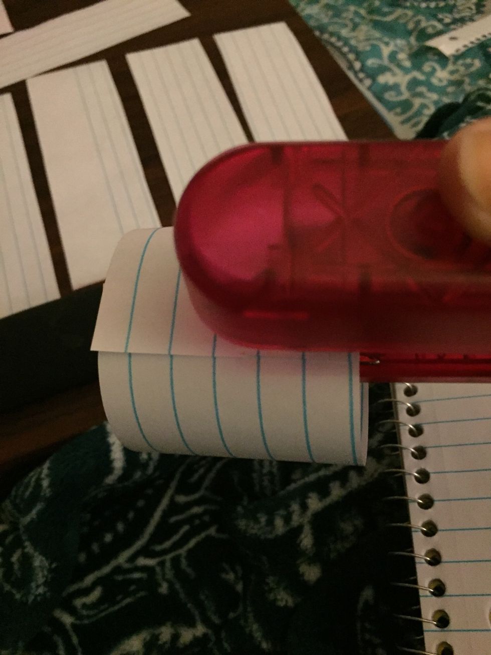 Staple on the flat that you folded over to secure the chain