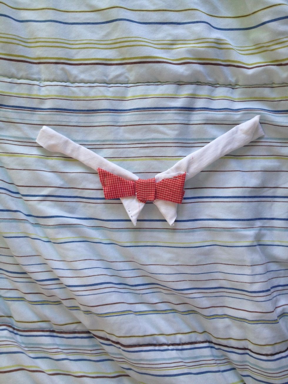 Staple the bow to the collar.