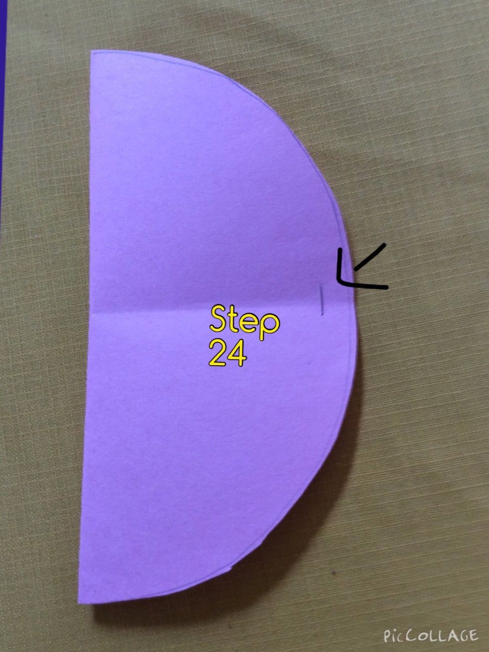 Staple the middle of the half circle where it arches.Do this for all 15 ornament pieces.