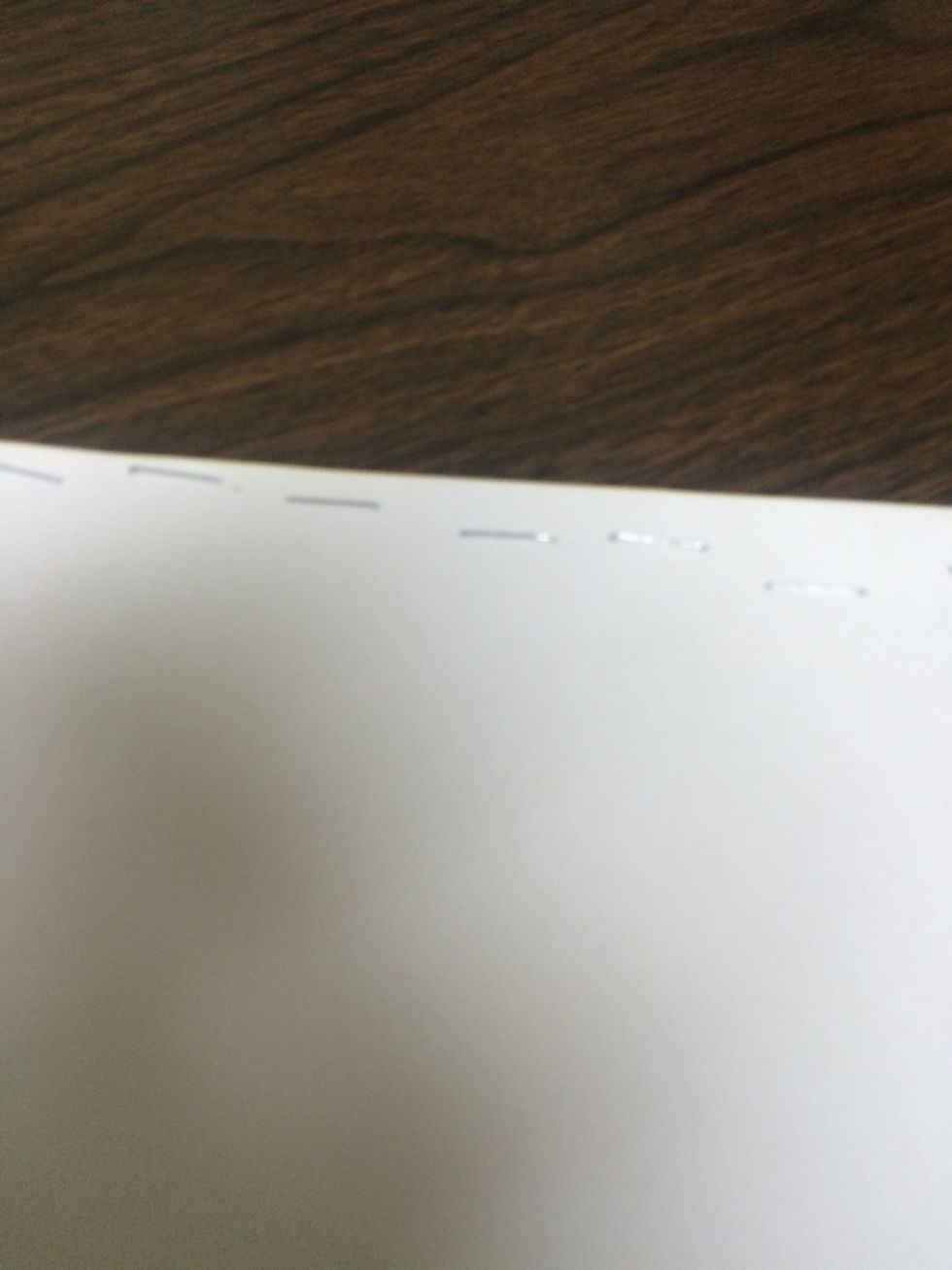 Staple the top part of the paper