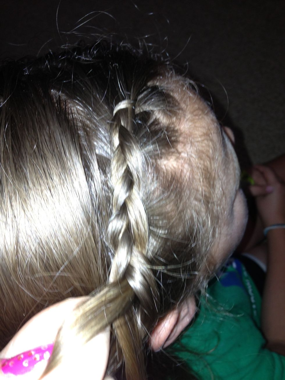 Start a Dutch braid from top hair top to the corner of the ear