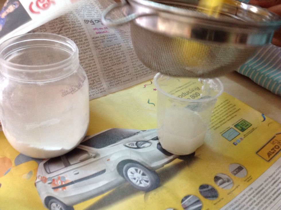 Start adding borax powder or washing soda.I used washing soda.Sieve the powder and add it.Add till it gets to a saturation point