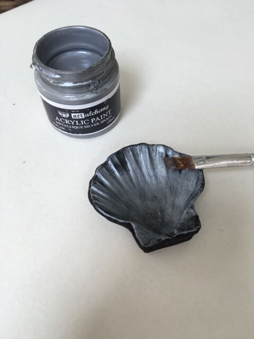 Start adding layers to your relics. For the shell and figures I used Silver Spoon and Violet-Gold followed by some Lindys Long John Silver.