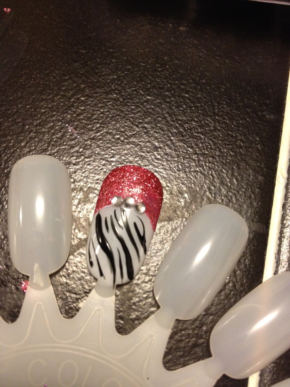 Start adding rhinestones. You can purchase rhinestones on eBay for 2.00 for 20,000 of them :)